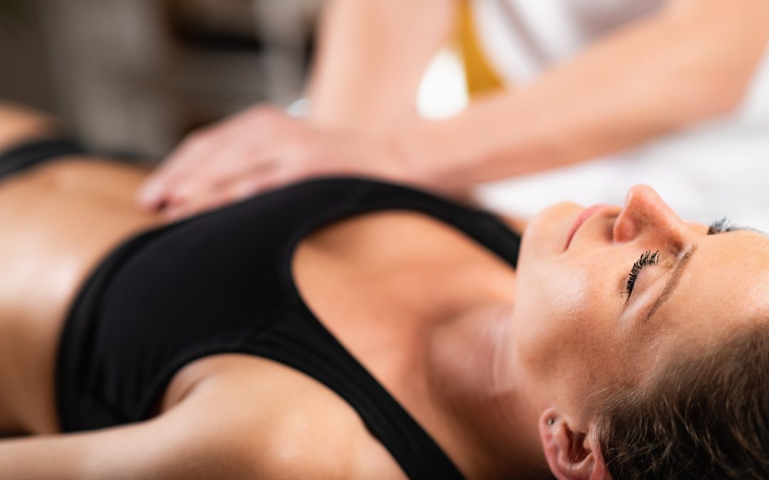 Chiropractor Working with Female Athlete