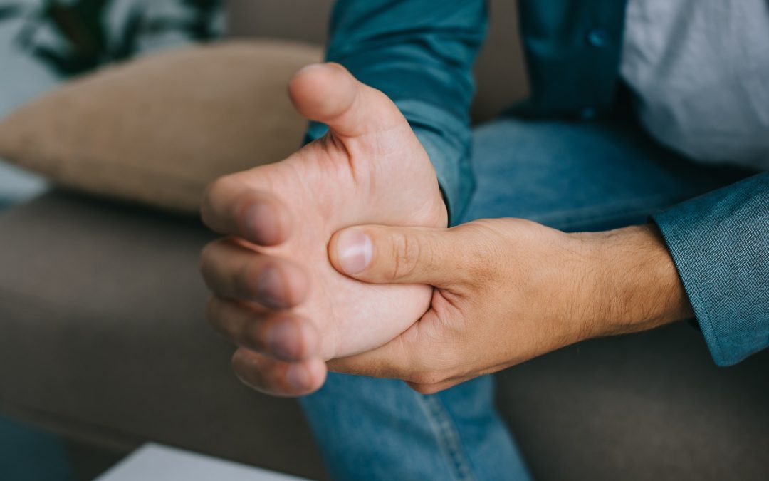 close-up partial view of man having wrist pain