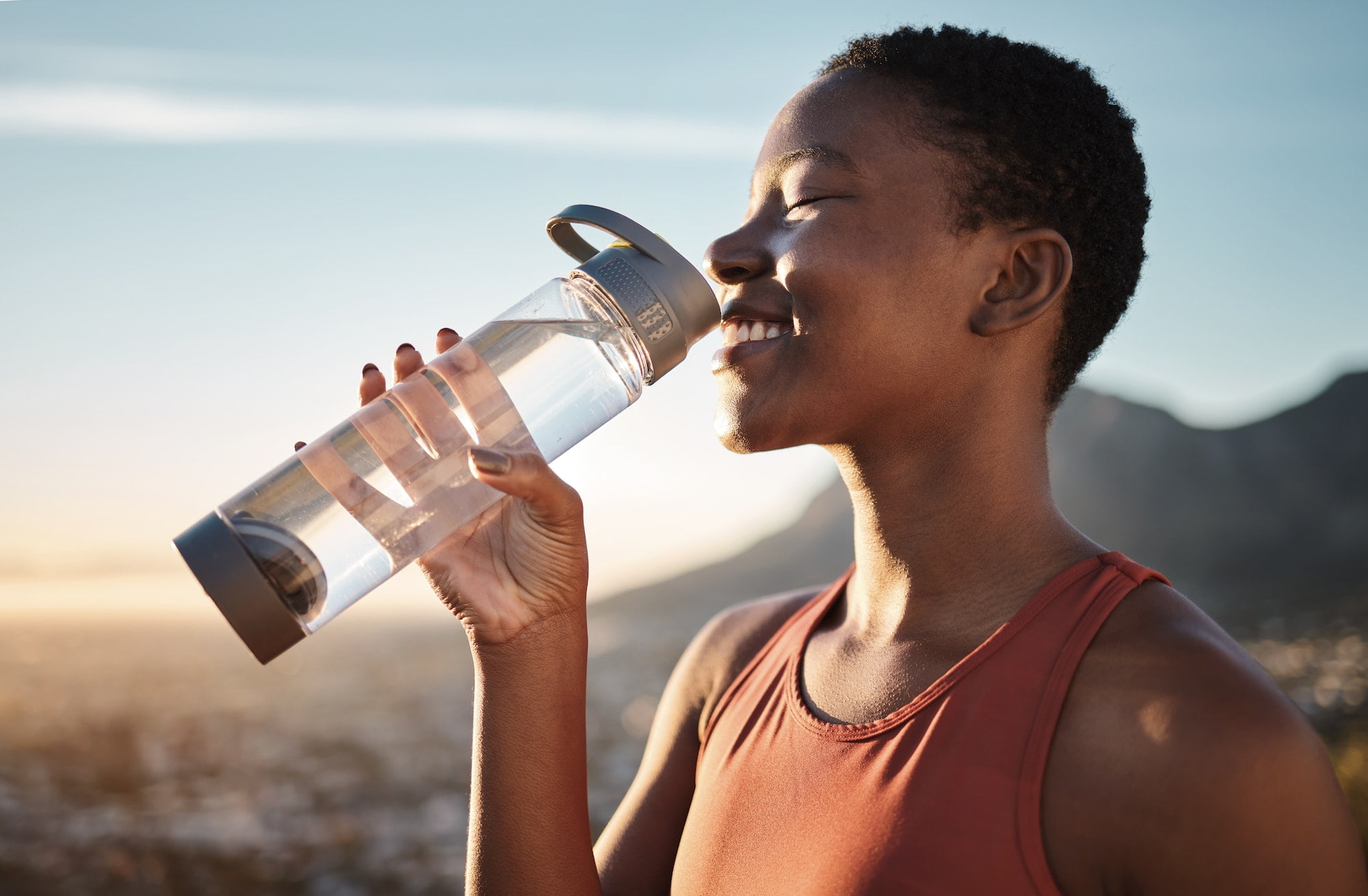 Water, relax and black woman training in nature, happy hiking and fitness progress in Taiwan. Hydra